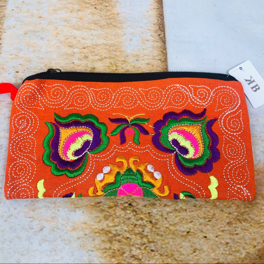 Embroidered fabric wristlet -